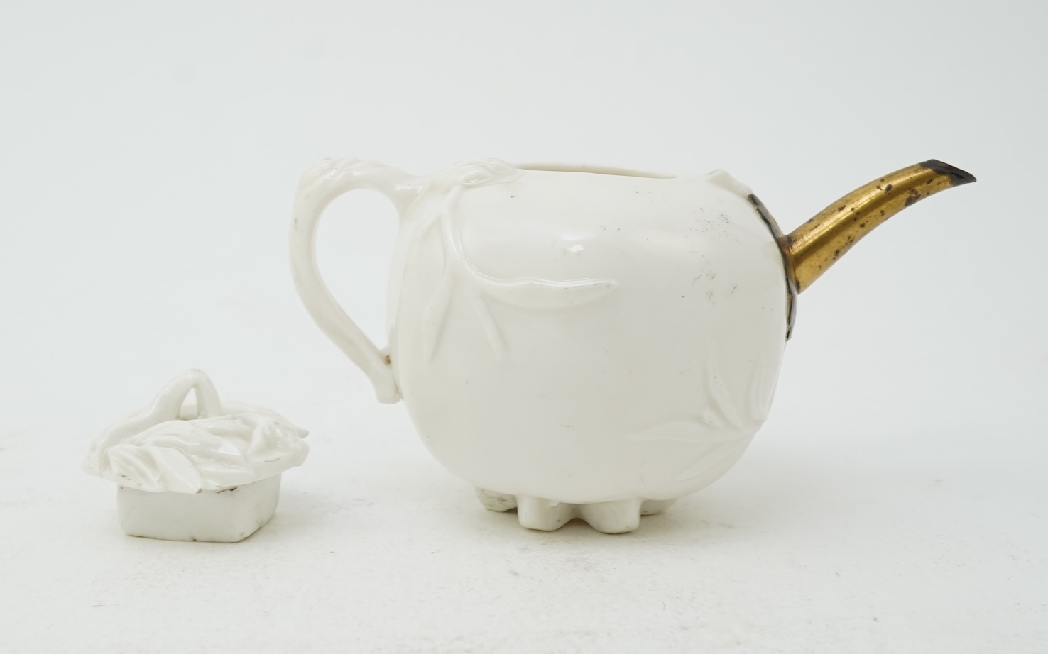 A Chinese Dehua blanc-de-chine ‘pomegranate’ teapot, mid 17th century